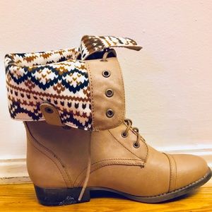 One pair lace up combat boots